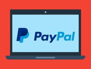 PayPal-logoet ses på en skærm på laptop.